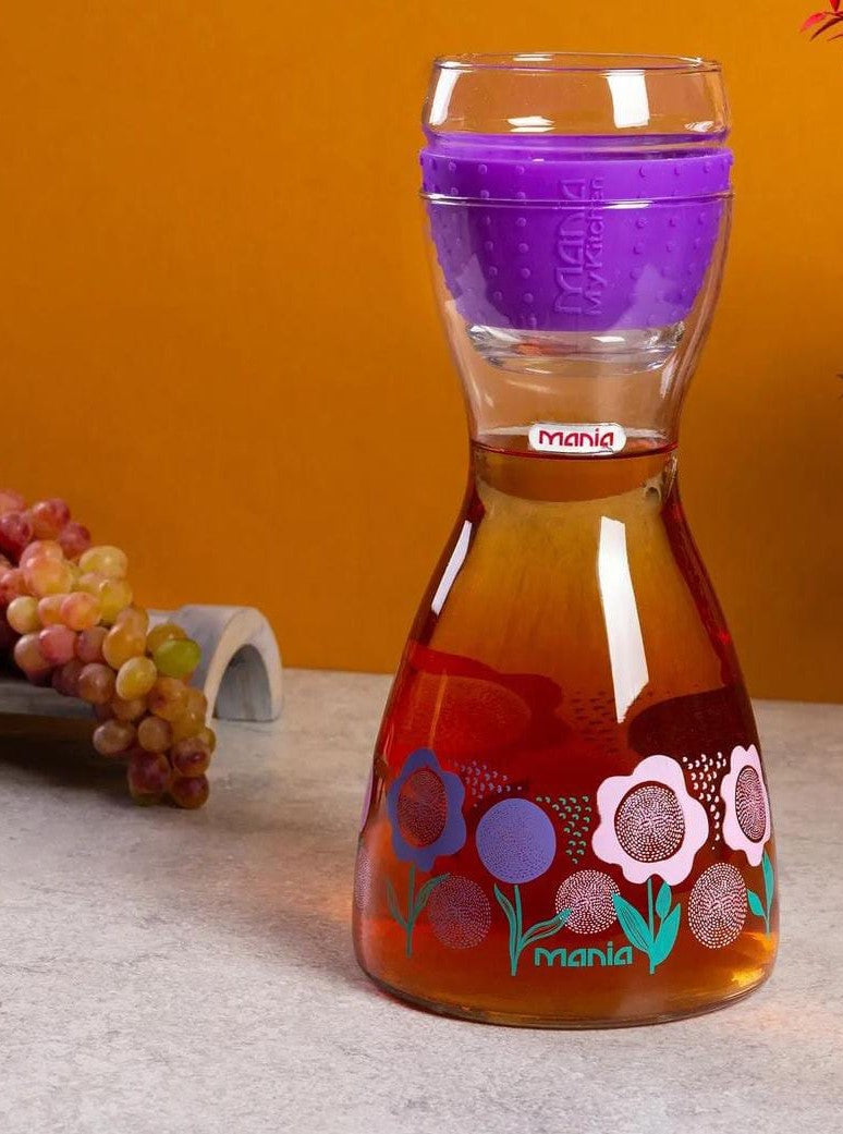 Royal Glass Pitcher Bottle With A Glass Over it. Stylish Glass Bottle With Glass. Glass Bottle With Drinking Glass.