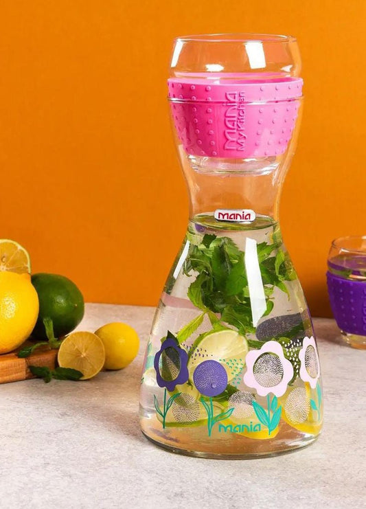 Royal Glass Pitcher Bottle With A Glass Over it. Stylish Glass Bottle With Glass. Glass Bottle With Drinking Glass.